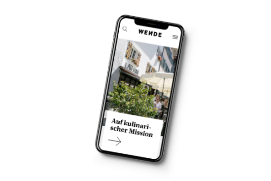 An iPhone that shows the home page of Wende’s website